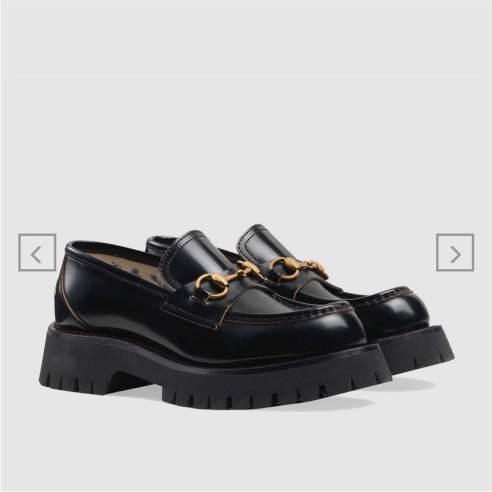 Gucci Harald Lug Sole Black Loafers with Gold Detailing